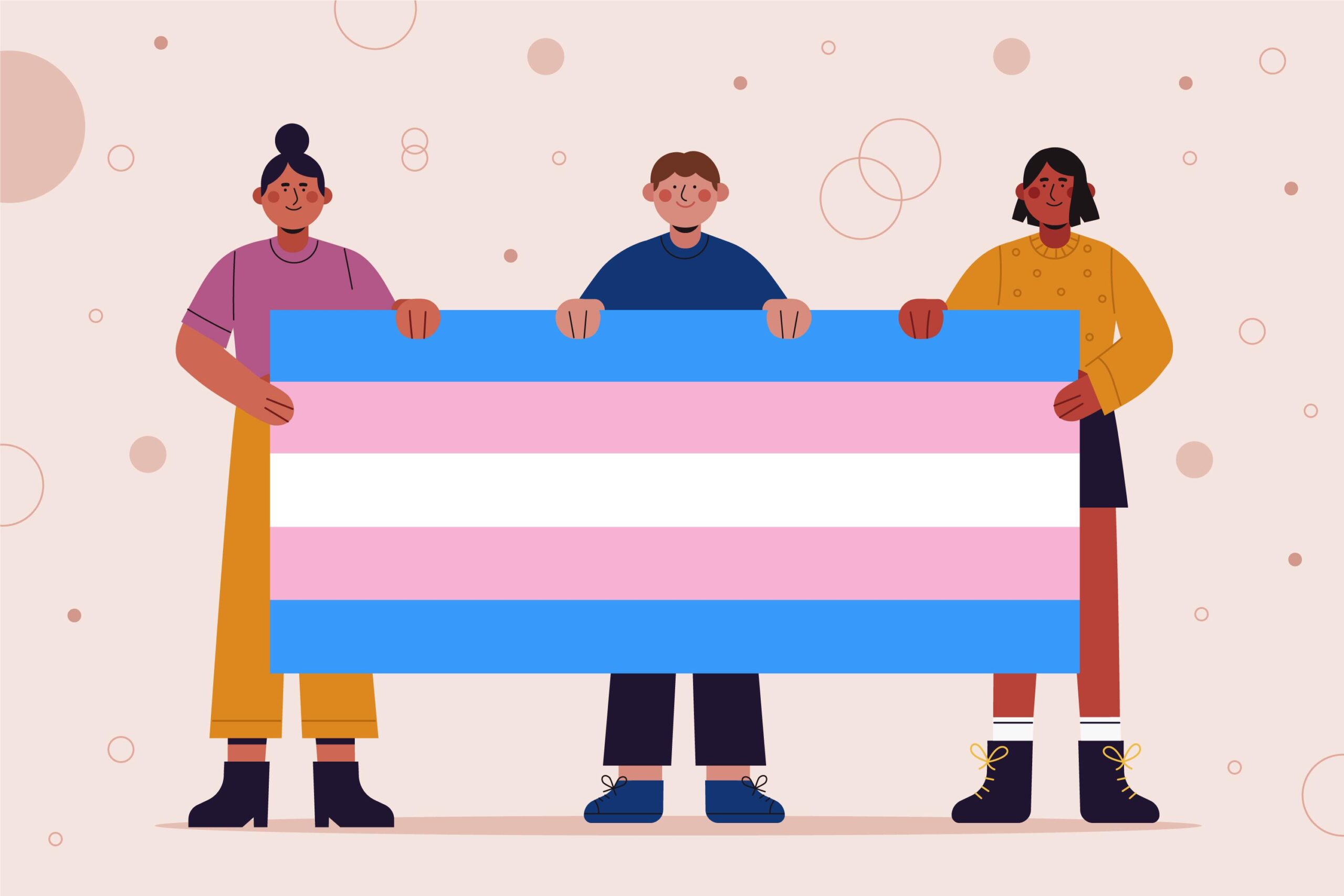 Imagem da bandeira trans, com pessoas a segurando.