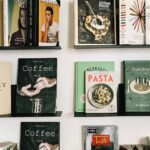 A beautifully curated bookshelf displaying a diverse collection of books in a modern library setting.